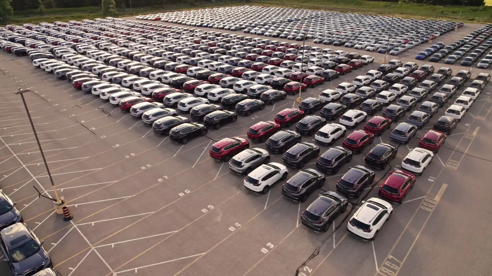 Aerial view of a large lot of parked cars